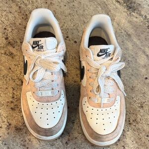 Women’s pink and cream Nike Air Force 1